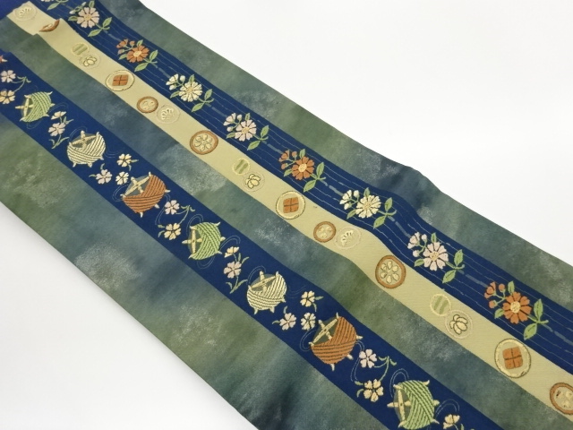 引箔糸巻きに花々・丸文模様織出し名古屋帯